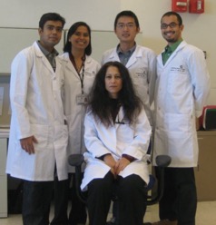 Andrew with other faculty